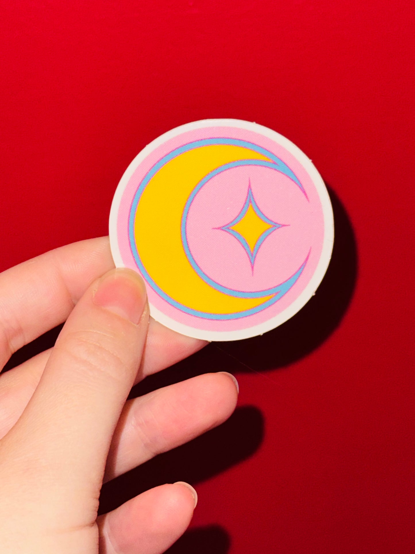 "Moon" sticker by Coilaroid Press