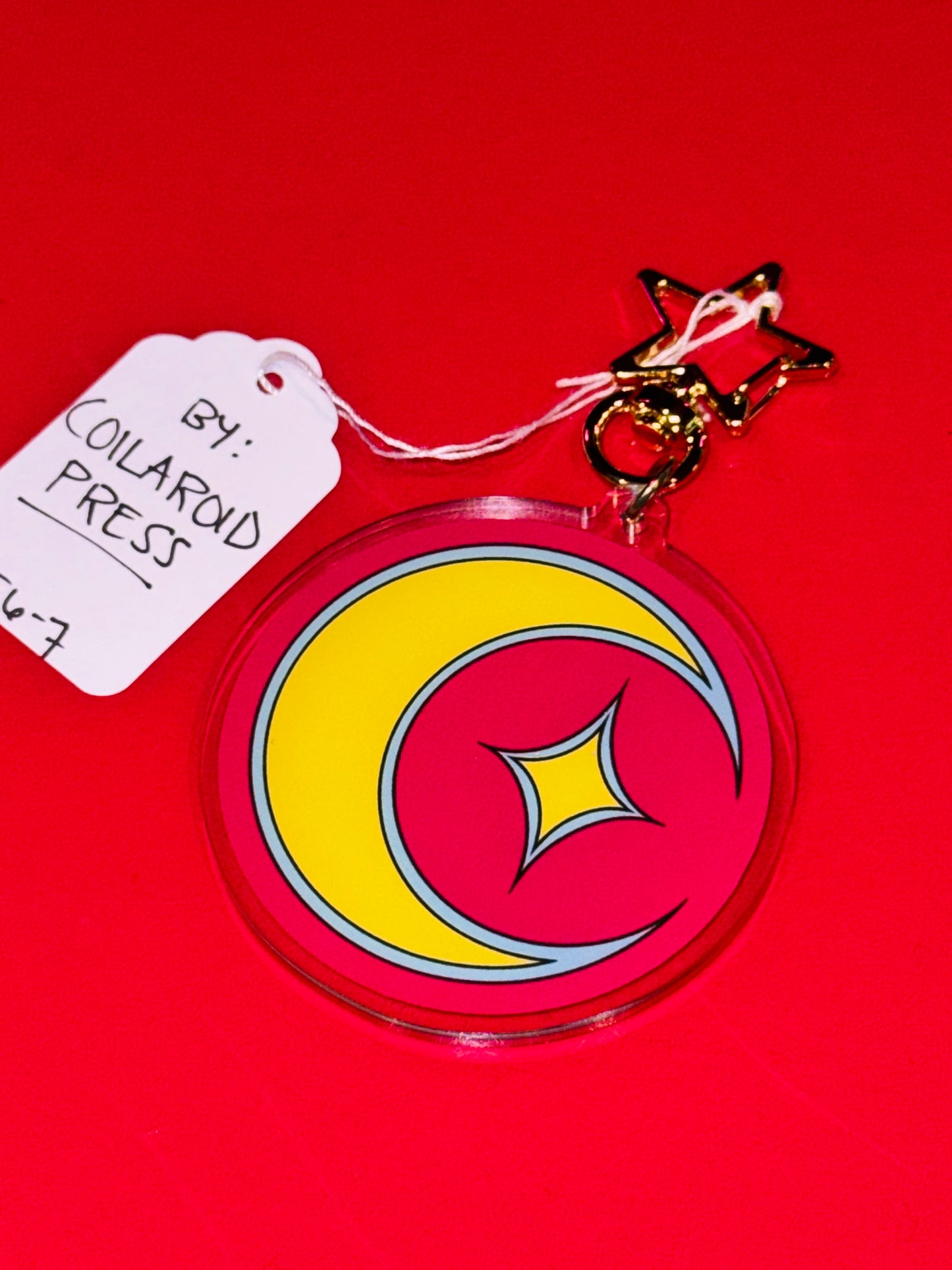 "Moon" keychain by Coilaroid Press