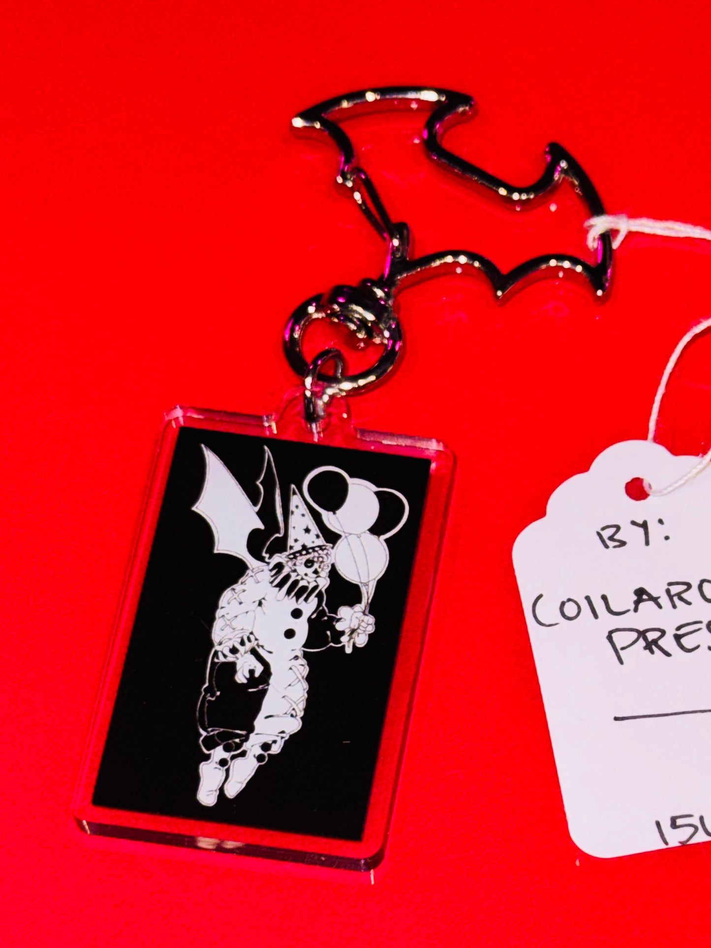 "Pierrot" keychain by Coilaroid Press