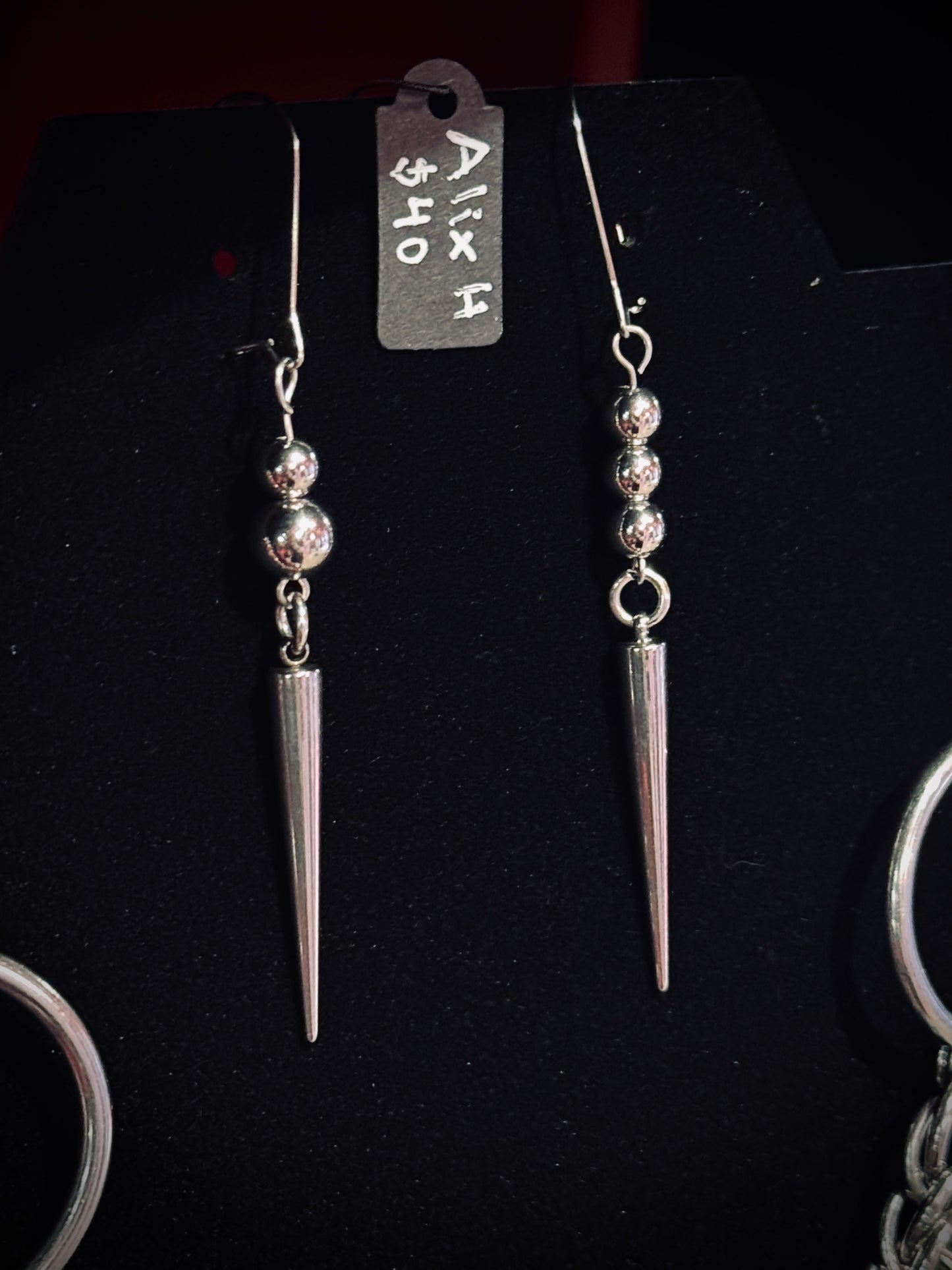"Asymmetrical Fangs" earrings by Alix Holly
