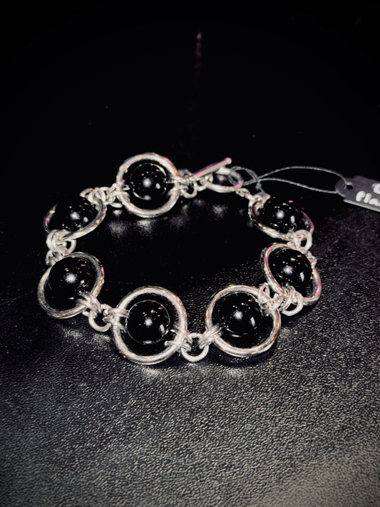"Dead Planets" bracelet by Alix Holly